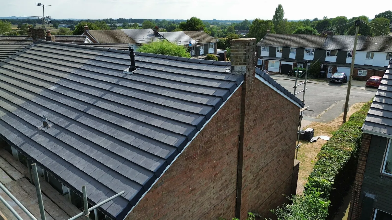 Drone view of a completed grey tiled roof