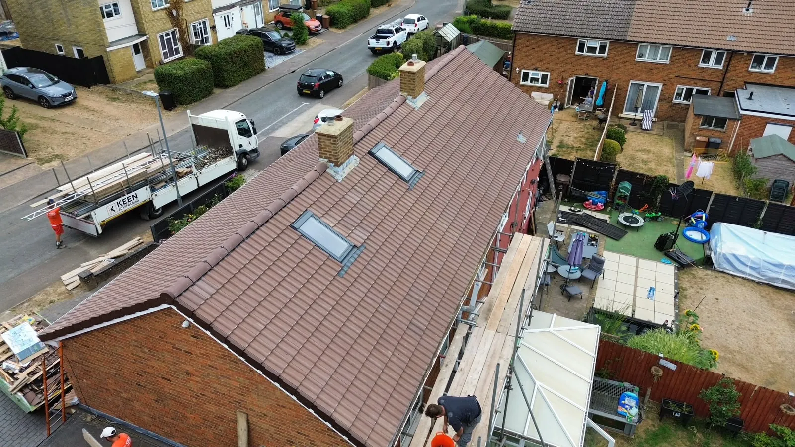 Aerial drone view across residential rooftops during a survey