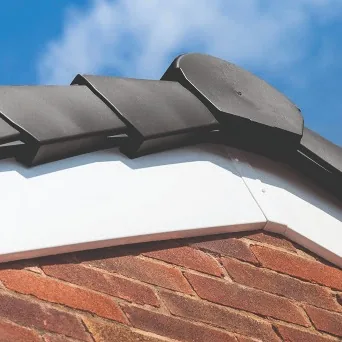 Close-up of an interlocking dry verge cap