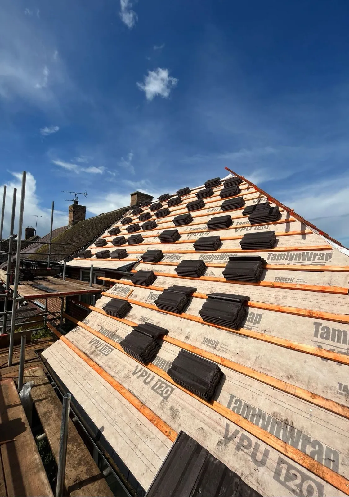 Exposed roof rafters and timber structure during a re-roof