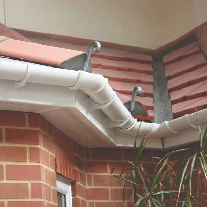 Roofer carrying out a planned roof maintenance check
